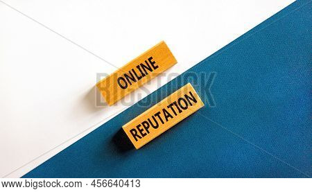 Online Reputation Symbol. Wooden Blocks With Concept Words Online Reputation On Beautiful Whiteand B