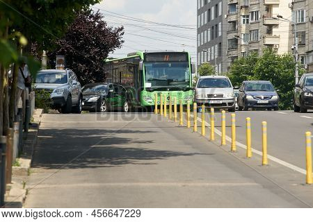 Bucharest, Romania - June 17, 2022: A Public Transport Bus Mercedes Citaro Hybrid Is Driven In Traff