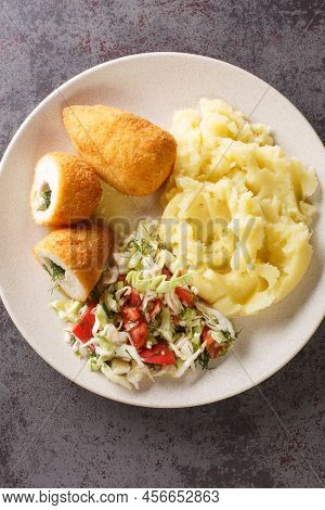 Chicken Kiev Is A Dish Made Of Chicken Cutlet Stuffed With Butter Abd Herbs Served With Salad And Ma