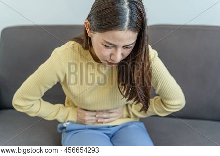 Flatulence Young Asian Woman, Girl Hand In Stomach Ache, Suffer From Food Poisoning, Abdominal Pain 