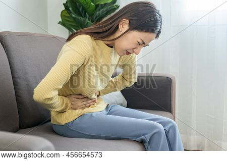 Flatulence Young Asian Woman, Girl Hand In Stomach Ache, Suffer From Food Poisoning, Abdominal Pain 