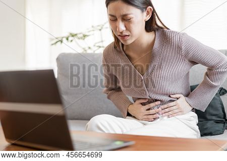 Flatulence Asian Young Woman, Girl Hand In Stomach Ache, Suffer From Food Poisoning, Abdominal Pain 