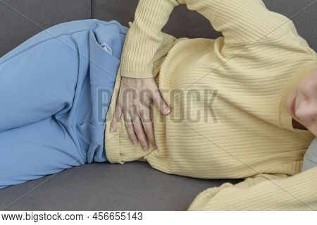 Flatulence Young Asian Woman, Girl Hand In Stomach Ache, Suffer From Food Poisoning, Abdominal Pain 