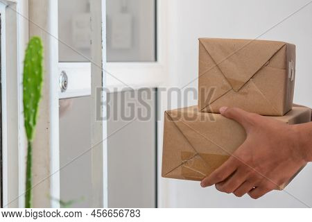 Delivery Man Employee, Postman Hold Cardboard Box,parcel Or Packet For Send To Client,customer In Bl