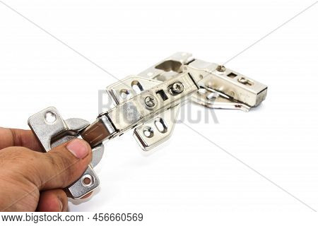 A Picture Of Stainless Steel Hydraulic Hinges With Selective Focus