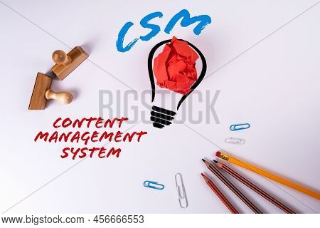 Csm Content Management System. Abstract Light Bulb And Pencils On A White Background