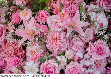 Big Bouquet Of Flowers In A Vase On A Gray Wall Background