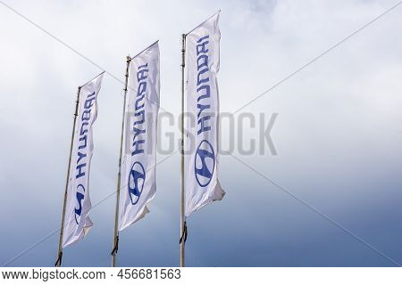 Krasnoyarsk, Russia - June 19, 2022: Hyundai Dealership Banners Against Cloudy Sky Background. Hyund