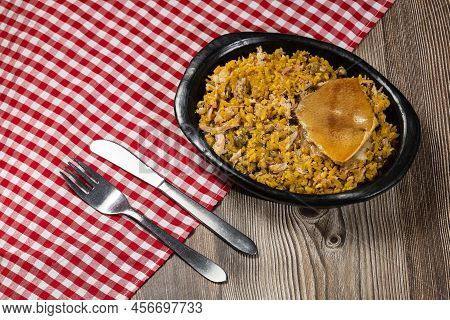 Suckling Pig With Rice, Potato, Arepa - Typical Colombian Gastronomy