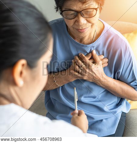 Elderly Patient, Senior Old Aging Woman With Coronary Artery Disease Or Heart Illness With Cardiolog