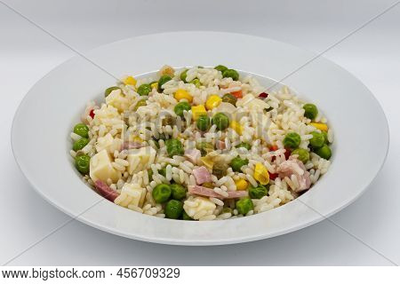 Italian Cold Rice Salad, Riso Freddo. Fresh And Healthy Summer Salad On White Background.