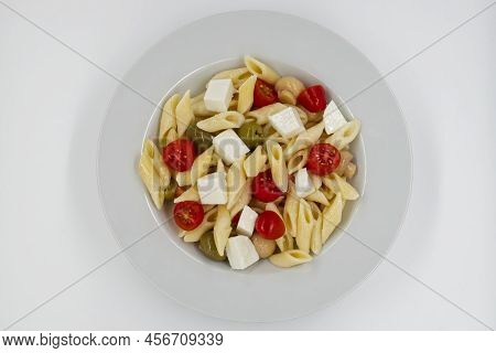 Italian Summer Salad Pasta Fredda. Fresh And Healthy Summer Salad On White Background. Top View