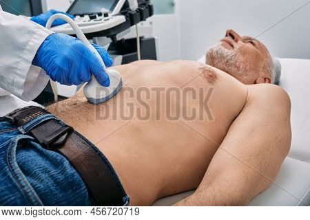 Abdominal Ultrasound With Ultrasound Machine For Male Patient, Close-up