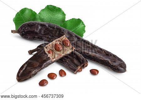 Ripe Carob Pods And Bean Isolated On White Background With Full Depth Of Field