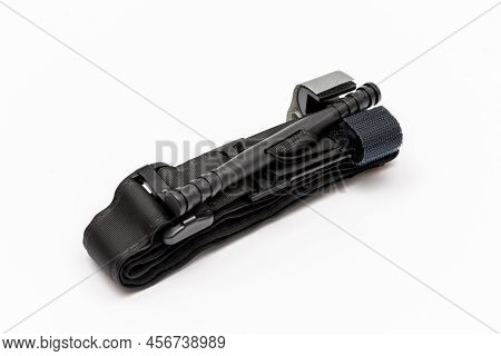 Hemostatic Tourniquet, Tourniquet With A Strong Plastic Twist And A Hybrid Clasp On A White Backgrou
