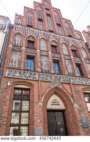 Nicholas Copernicus House (15th Century). Torun, Poland. Polish Text - Nicholas Copernicus House