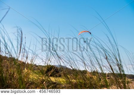 Parasailing Over Las Flores Beach, On A Very Hot Day During The Summer At Maldonado, Uruguay.