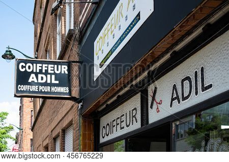Anderlecht, Brussels Capital Region, Belgium - 06 11 2022 - Sign Of The Local Adil Barber Shop