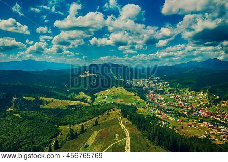 Aerial View Of Summer Mountains Range Near Bukovel, Carpathian Mountains, Ukraine. Travel Vacation L