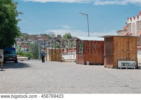 Teotitlan Del Valle, Oaxaca, Mexico- May 23, 2022: Little Shops And Man Walking At The Street In A S