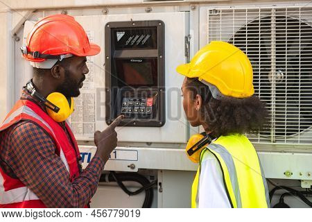 Engineer Control Reefer With Air Conditioner At Container Box.