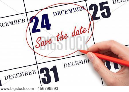 24th Day Of December. Hand Drawing Red Line And Writing The Text Save The Date On Calendar Date Dece