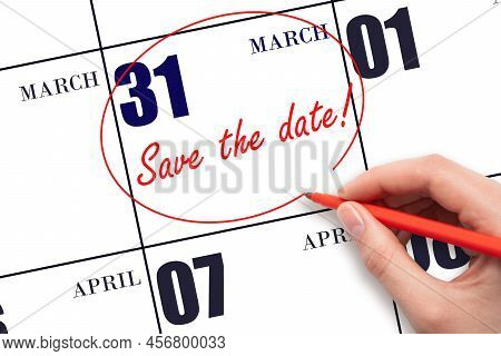 31st Day Of March. Hand Drawing Red Line And Writing The Text Save The Date On Calendar Date March 3