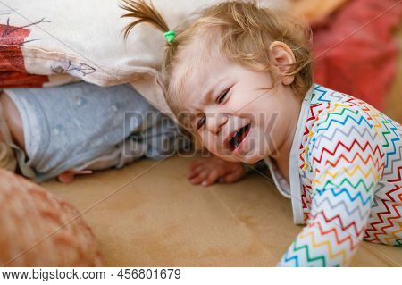 Cute Upset Unhappy Toddler Girl Crying. Angry Emotional Child Shouting. Portrait Of Kid With Tears I