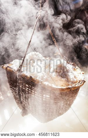 Boiling Rock Salt On Firewood Oven. Salt Is Still Produced In The Traditional Way In Bo Kluea, Thail