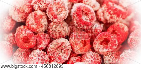 Frozen Organic Raspberry In White Frosty Frame Close Up. View From Above. Banner.