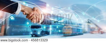 Transportation And Logistics Concept, Import And Export Business, Businessman Handshake Of Global Ne