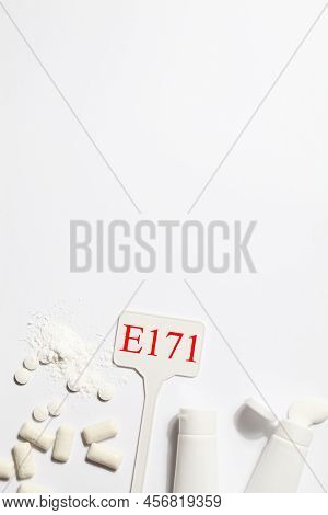 Titanium Dioxide, E171, Dangerous Additive Concept. Gum, Pills, Toothpaste, Powder And Sign With E17