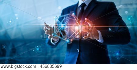 Businessman Holding Abstract Digital Networking Structure On Global Network Connection And Data Exch