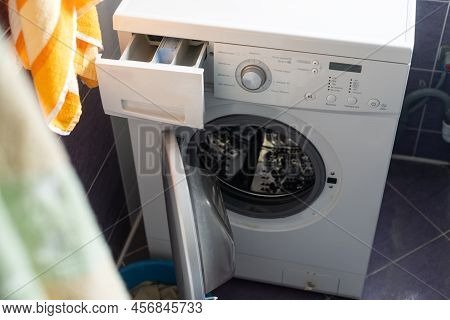Large Dump Of Old And Unusable Ferrous Material And A Large Broken Washing Machine. Heap Of Old Scra