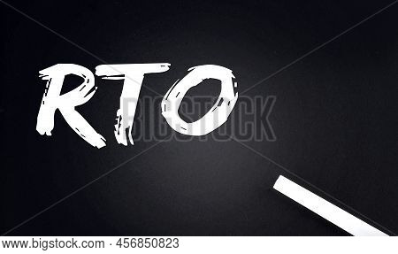 Rto - Recovery Time Objective Text On Black Chalkboard With Piece Of Chalk