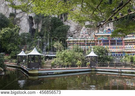 Kuala Lumpur, Malaysia - Jun 06, 2022: Pond With Artificial Waterfalls, Bridges And Gazebos For Rela