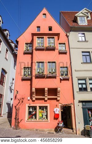 Eisleben, Germany - March 21, 2022: Shop In Historic Red House On The Market Square Of Eisleben, Ger