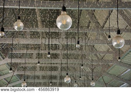 Art Vintage And Retro Lamp Led Lighting Hanging On Roof In Architecture Building Of Classic Coffee S
