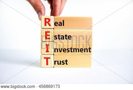 Reit Real Estate Investment Trust Symbol. Concept Words Reit Real Estate Investment Trust On Wooden 