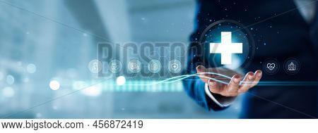 Businessman Hold Virtual Medical Network Connection Icons. Covid-19 Pandemic Develop People Awarenes