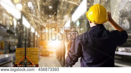 Factory Engineer Hold Tablet Manage Inventory Control And Deliverly Smart Transportation Through Int