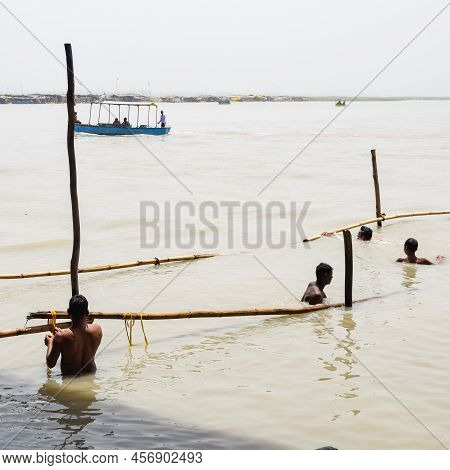 Garh Mukteshwar, Uttar Pradesh, India - June 11 2022 - People Are Taking Holy Dip On The Occasion Of