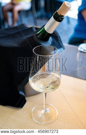 Drinking Of Txakoli Or Chacolí Slightly Sparkling Very Dry White Wine Produced In Spanish Basque Cou