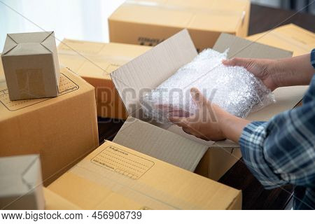 Closeup View Of Female Online Store Small Business Owner Seller Entrepreneur Packing Package Post Sh