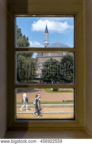 Sofia, Bulgaria - June 14: Pedestrians Pass Through Banski Square In Front Banya Bashi Mosque In Sof