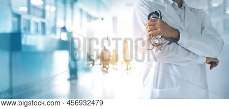Healthcare And Medical Concept. Medicine Doctor With Stethoscope In Hand And Patients Come To The Ho
