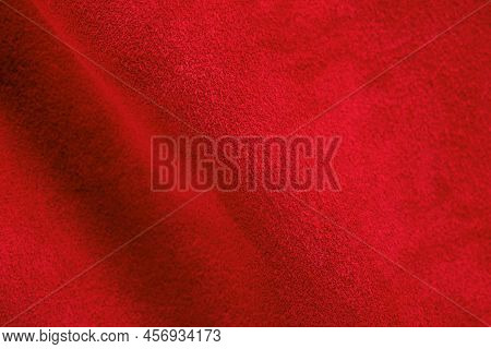 Velvet Red Background Close-up Photo. Red Suede Genuine Leather Background.