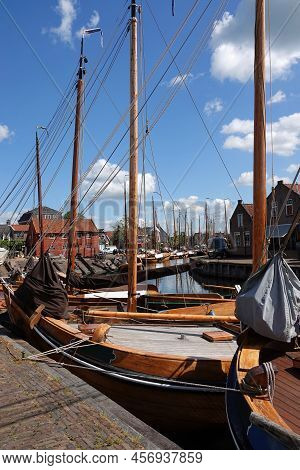 Old Historical Wooden Fishing Boats Moored Behind Each Other.  These Are Traditional Dutch Botter Bo
