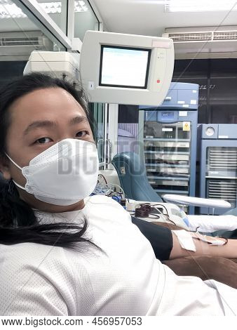 Platelet Apheresis Selfie Shot From Mobile Photo Shooting By An Asian Long Hair Man In The Blood Don