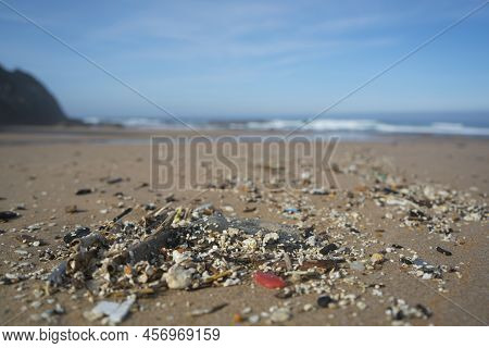 Plastic Waste And Micro Plastic Washed On The Shore Of The Atlantic Ocean